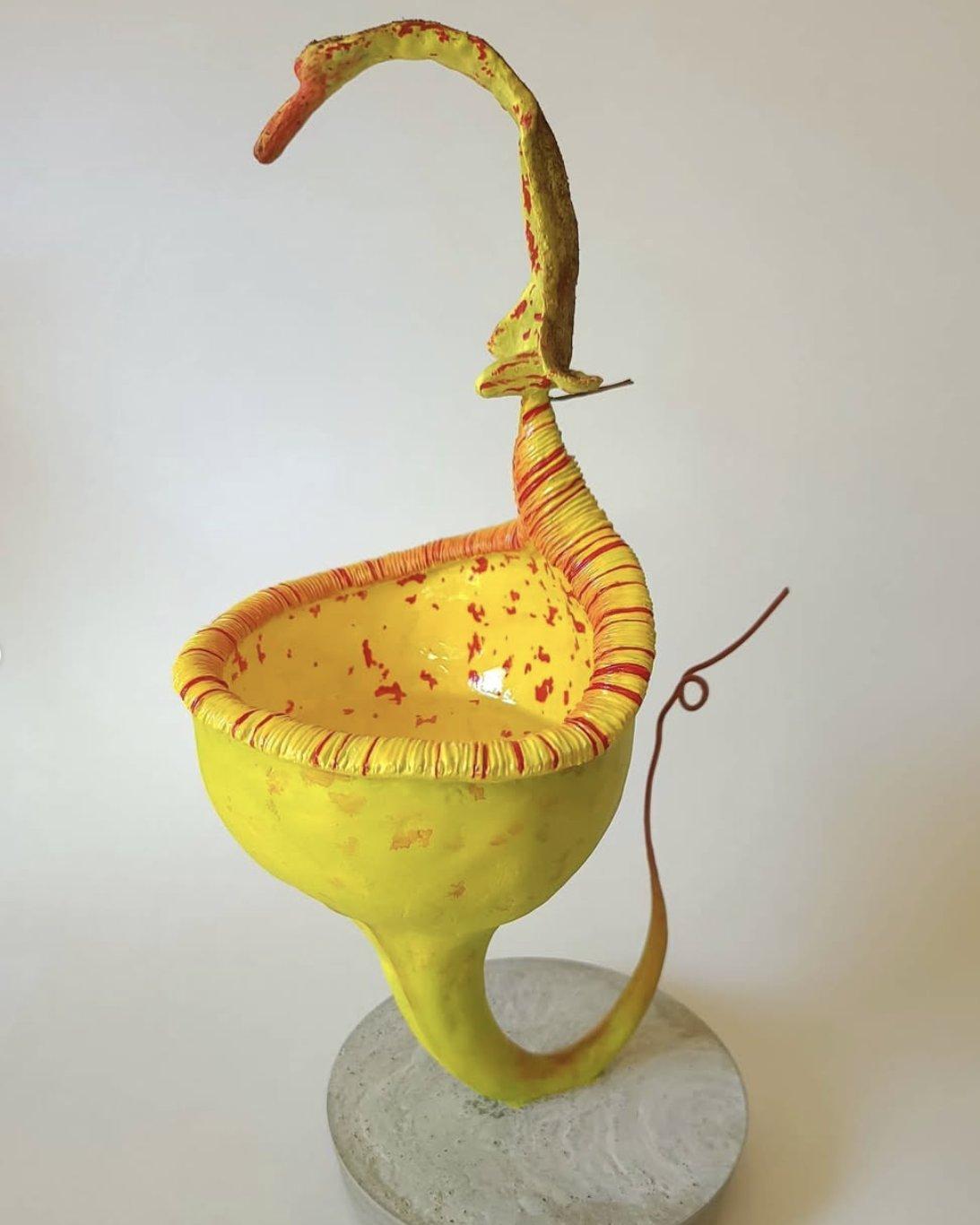 Golden Talon Pitcher
